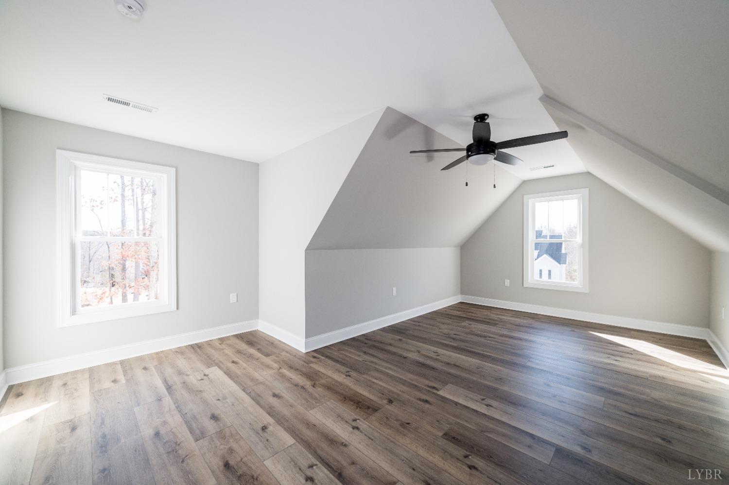 506 Bridge Tree Court Evington, VA 24550 - Photo 40 of 60 wooden floor in an empty room with a window