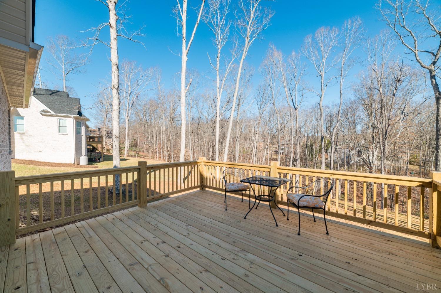 506 Bridge Tree Court Evington, VA 24550 - Photo 42 of 60 a view of a chairs on wooden deck