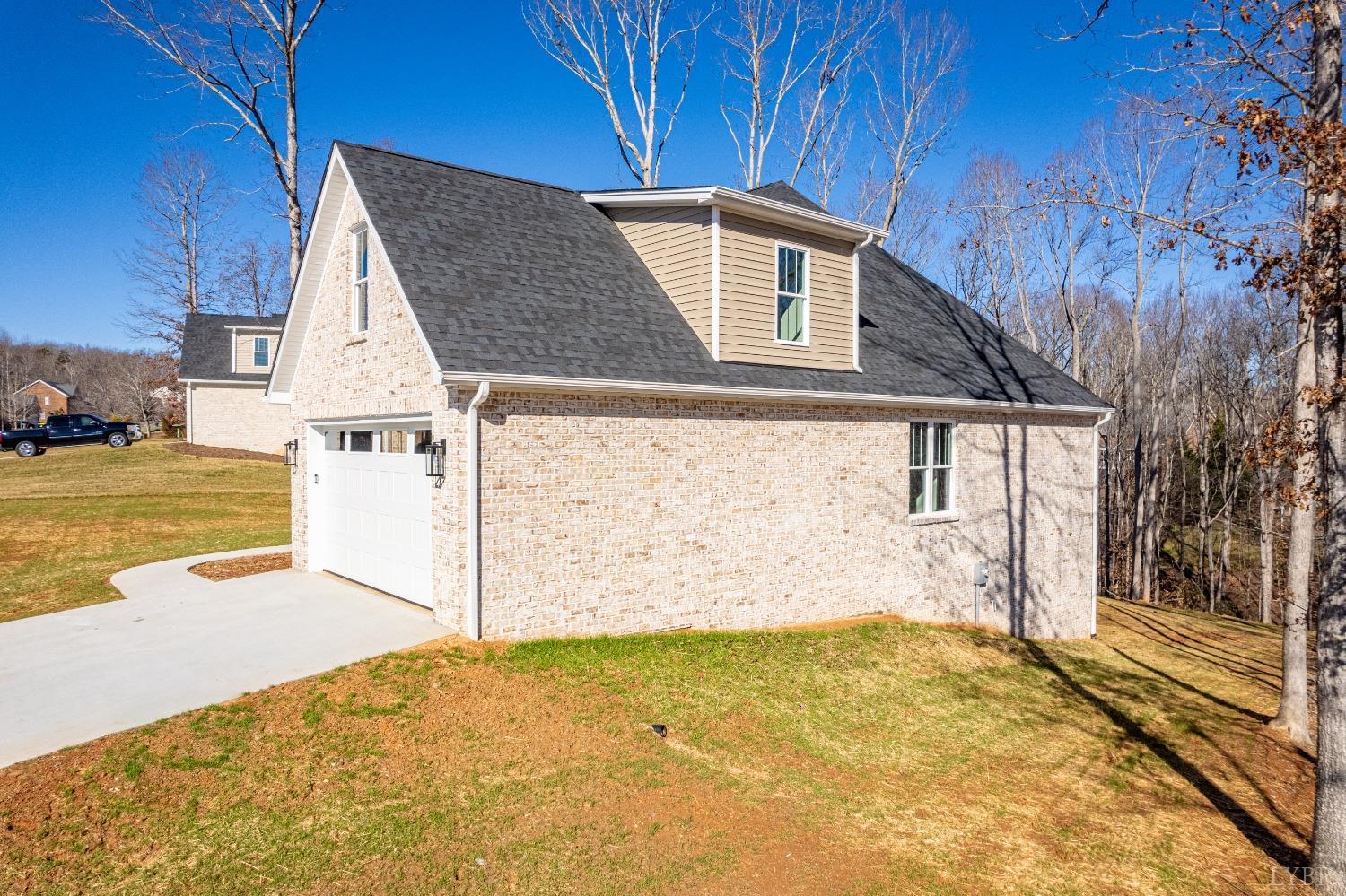 506 Bridge Tree Court Evington, VA 24550 - Photo 45 of 60 a view of a house with a backyard