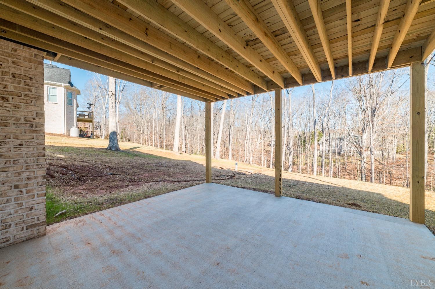 506 Bridge Tree Court Evington, VA 24550 - Photo 59 of 60 a view of an empty room with a birdcage and a window