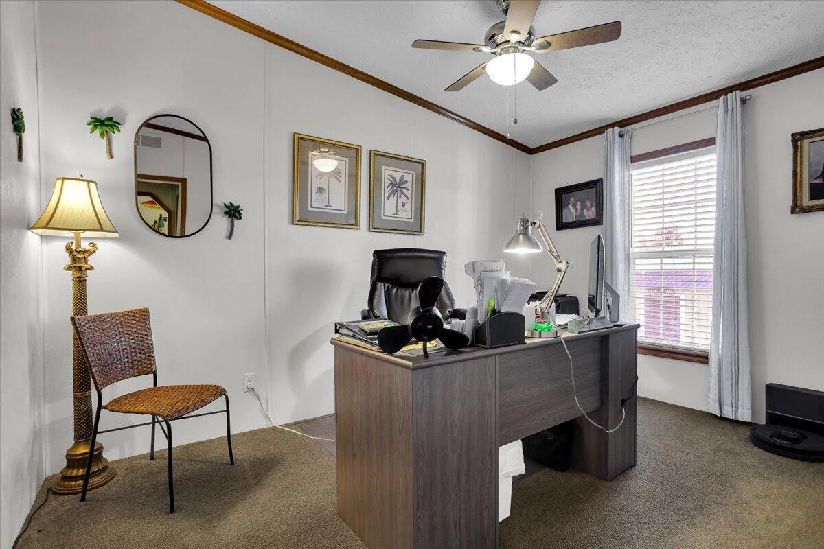 485 Big Cove Drive Penhook, VA 24137 - Photo 33 of 60 a living room with furniture and a window