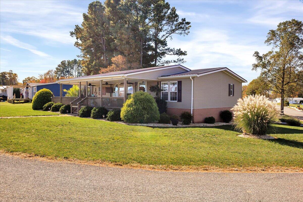 485 Big Cove Drive Penhook, VA 24137 - Photo 6 of 60 a view of a house with backyard and garden