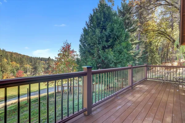 a view of outdoor space with trees all around