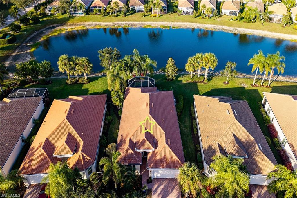 8595 Palermo Court Naples, FL 34114 - Photo 31 of 49 an aerial view of a house yard swimming pool and outdoor seating