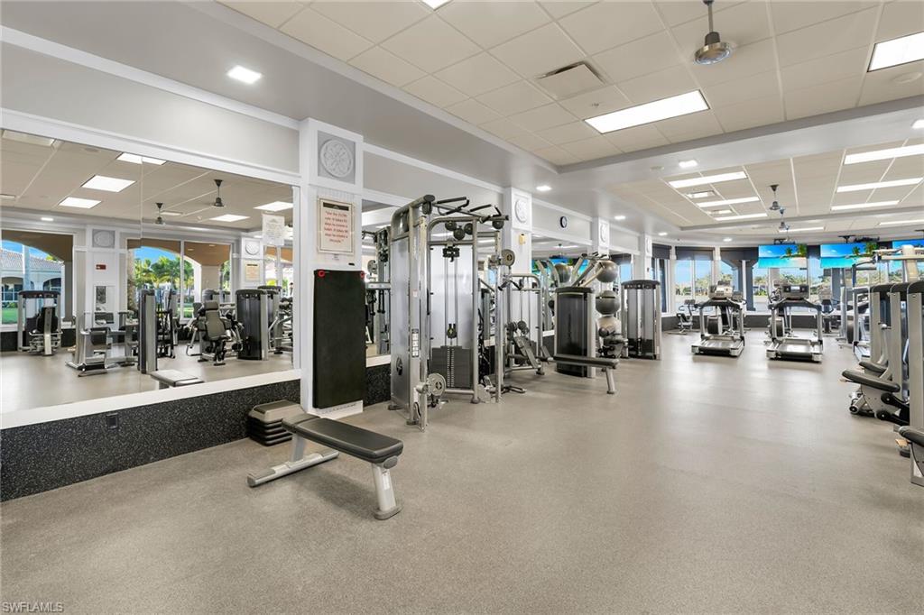 8595 Palermo Court Naples, FL 34114 - Photo 40 of 49 a view of a room with gym equipment