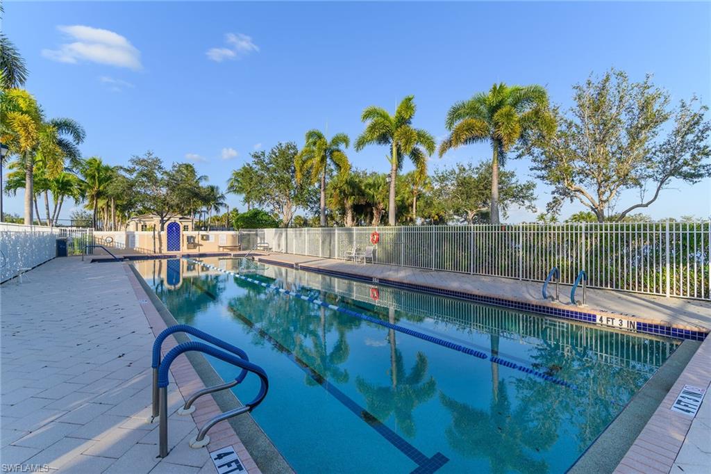 8595 Palermo Court Naples, FL 34114 - Photo 43 of 49 a view of a garden and outdoor seating