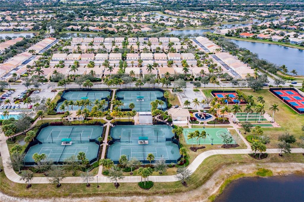 8595 Palermo Court Naples, FL 34114 - Photo 48 of 49 an aerial view of a houses with outdoor space