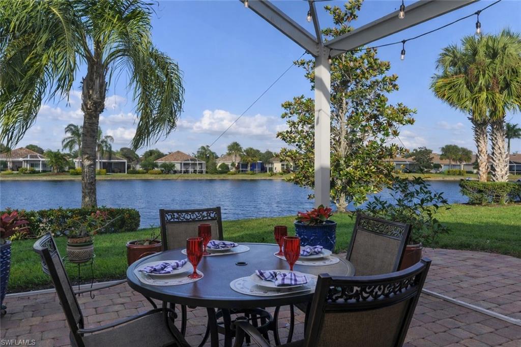 8595 Palermo Court Naples, FL 34114 - Photo 10 of 49 a view of a patio with furniture