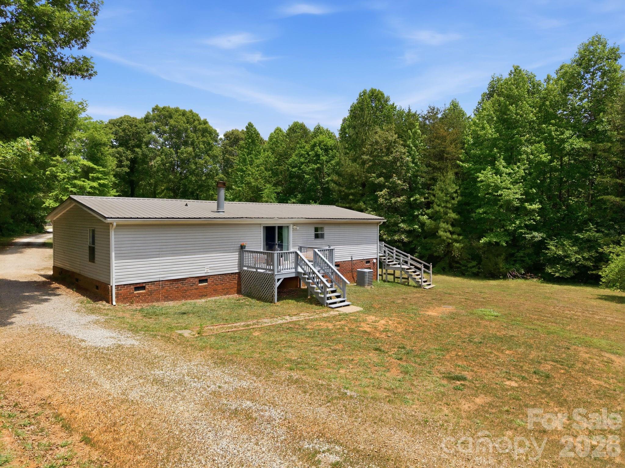 675 Overcash Road Salisbury, NC 28147 - Photo 37 of 48 a view of a house with a yard