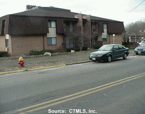 a car parked in front of a house