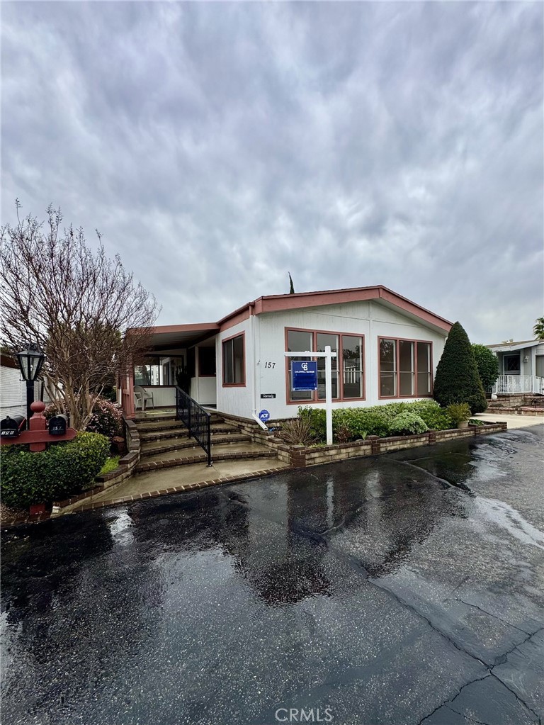 a view of house with outdoor space