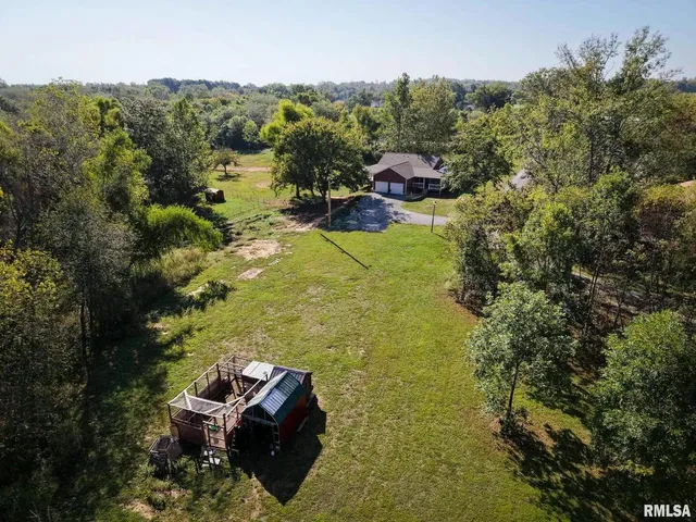 a view of a yard with an outdoor space