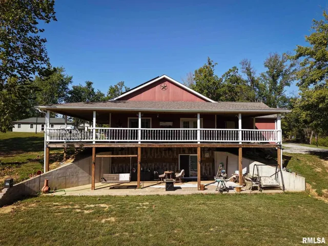 a view of a water fountain with a yard