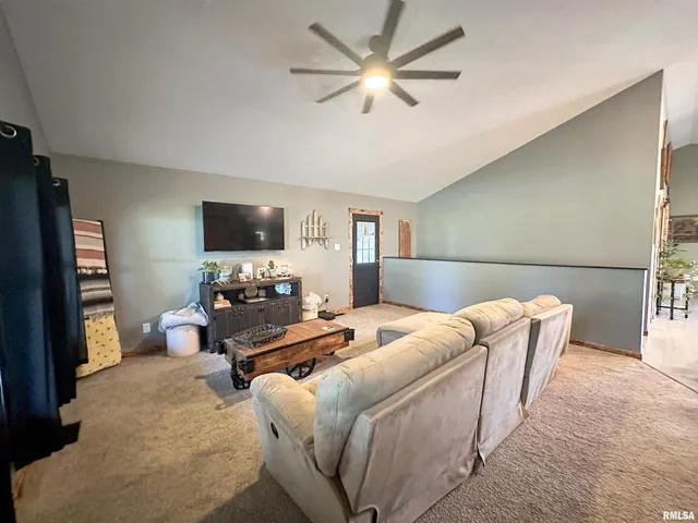 a balcony view with a seating space