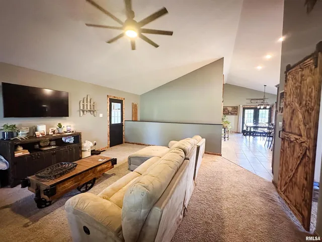a view of a balcony with wooden floor