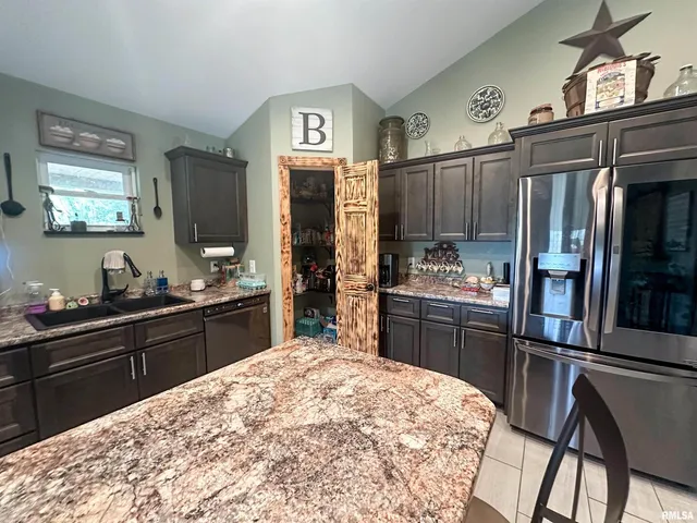 a bedroom with a bed and a closet