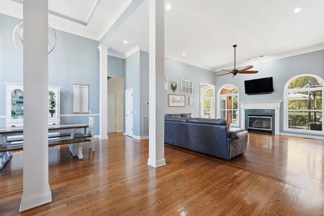 a view of living room with furniture and flat screen tv
