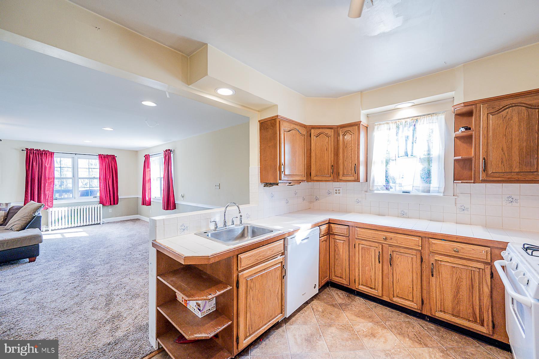 5565 Ashbourne Road Baltimore, MD 21227 - Photo 21 of 47 KITCHEN OPEN TO FAMILY ROOM