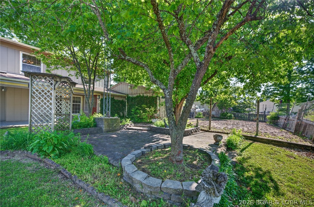 108 Dunwurkin Road Laurie, MO 65037 - Photo 11 of 63 Shady brick patio.
