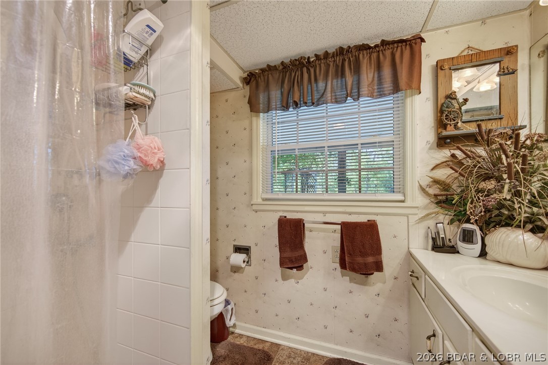 108 Dunwurkin Road Laurie, MO 65037 - Photo 45 of 63 Lower level - full bath.