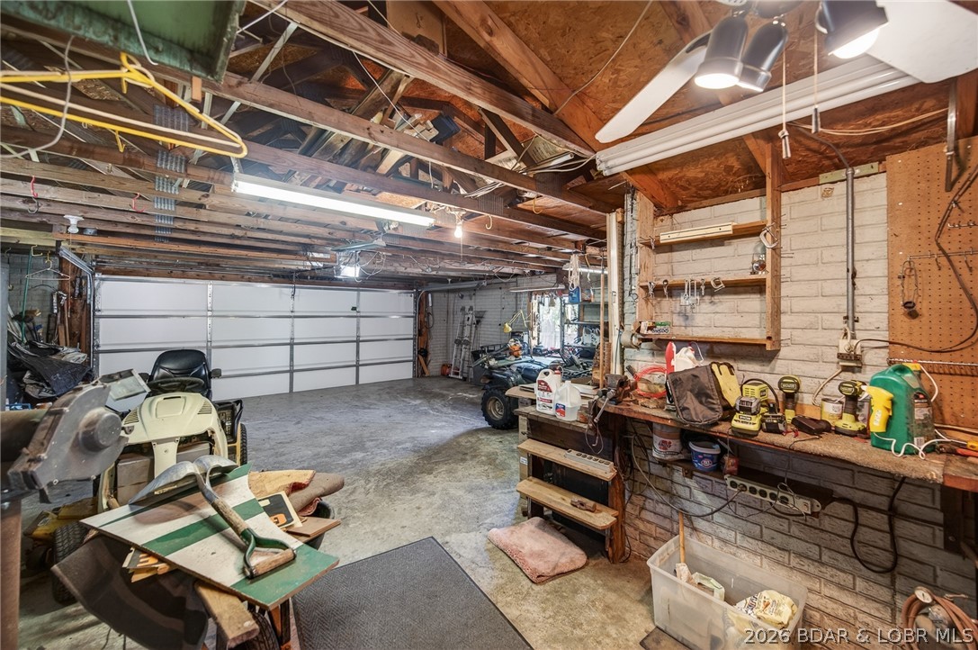 108 Dunwurkin Road Laurie, MO 65037 - Photo 54 of 63 Interior of 2 car attached garage and work bench.