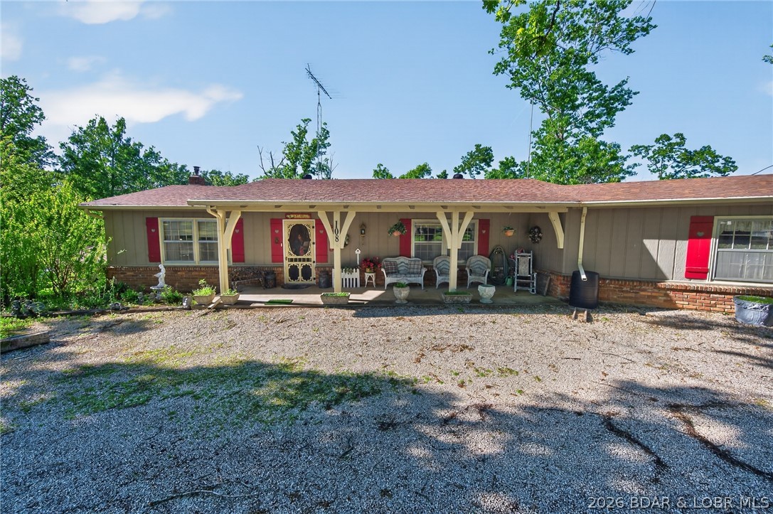 108 Dunwurkin Road Laurie, MO 65037 - Photo 61 of 63 Picture yourself relaxing on this charming front p