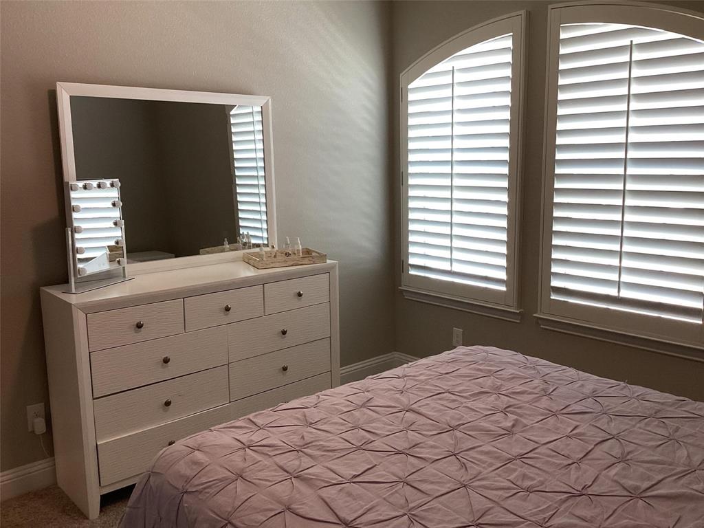 5984 Bursey Road Watauga, TX 76148 - Photo 18 of 21 Arched windows with white louvered shutters provide natural light