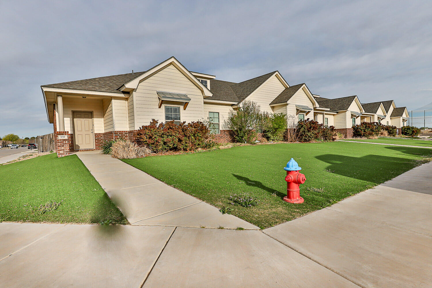 6702 Pontiac Avenue Lubbock, TX 79424 - Photo 1 of 41 a front view of a house with garden