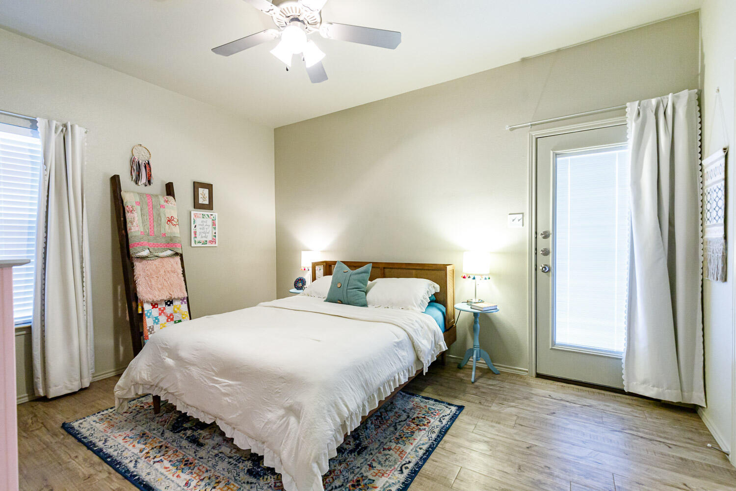 6702 Pontiac Avenue Lubbock, TX 79424 - Photo 22 of 41 a bedroom with bed and wooden floor