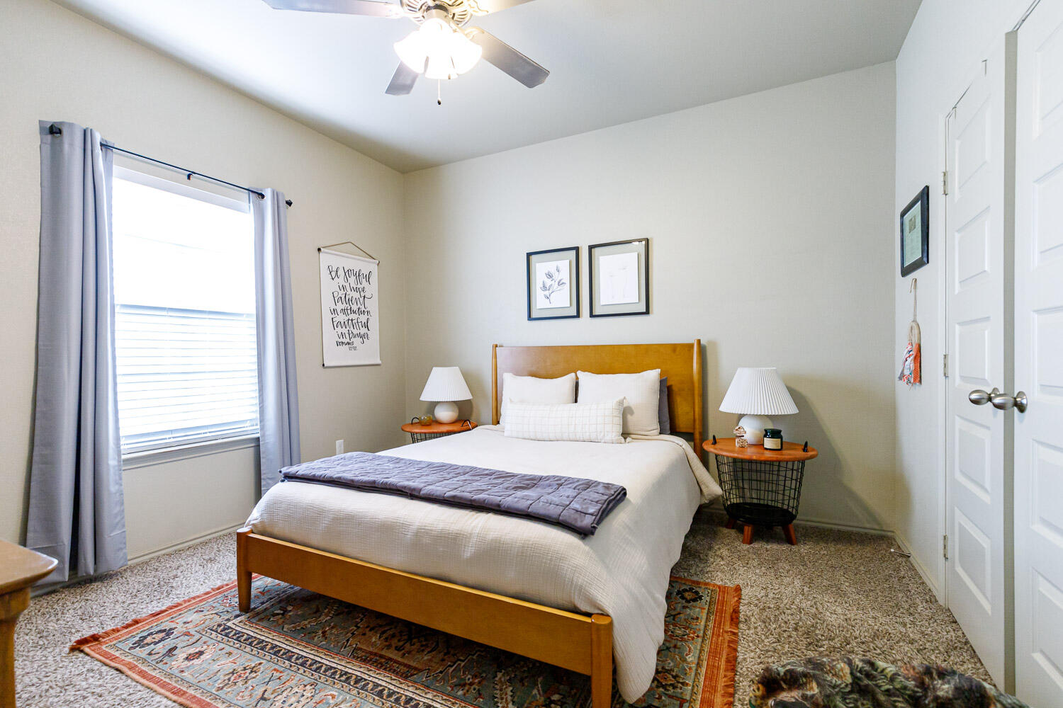 6702 Pontiac Avenue Lubbock, TX 79424 - Photo 30 of 41 a bedroom with a bed and a chandelier