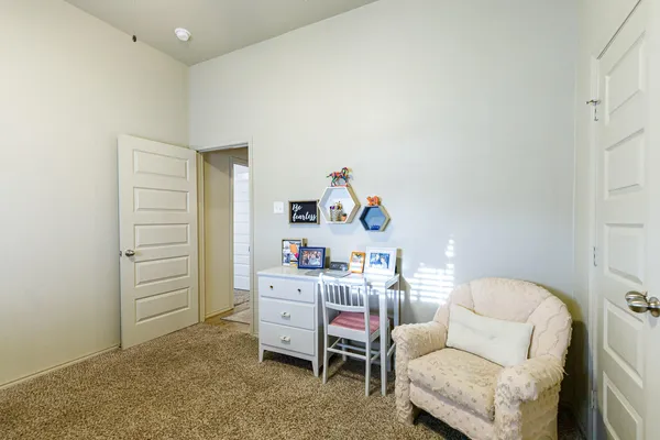 a room with a couch and a window