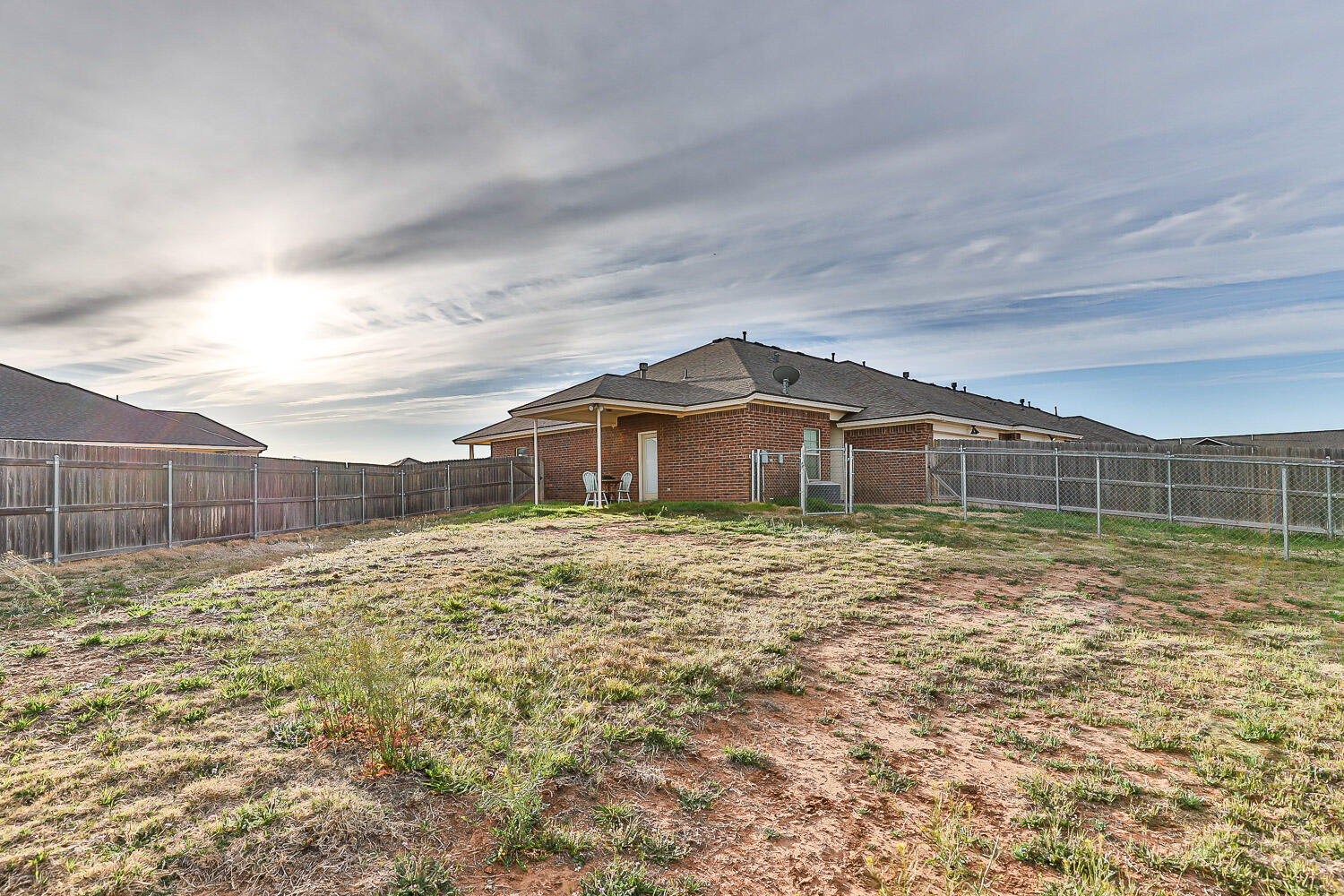 6702 Pontiac Avenue Lubbock, TX 79424 - Photo 38 of 41 a big room with wooden fence
