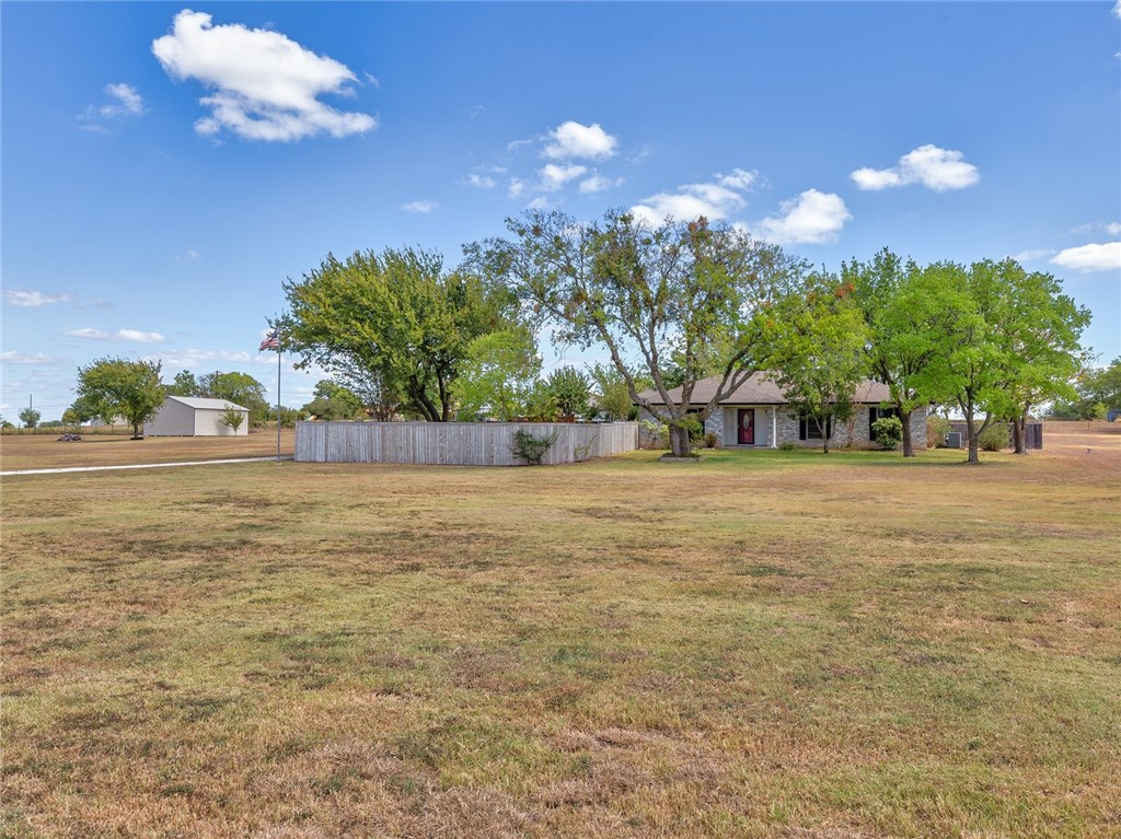 1803 Rowe Loop Pflugerville, TX 78660 - Photo 1 of 1 a house view with a swimming pool