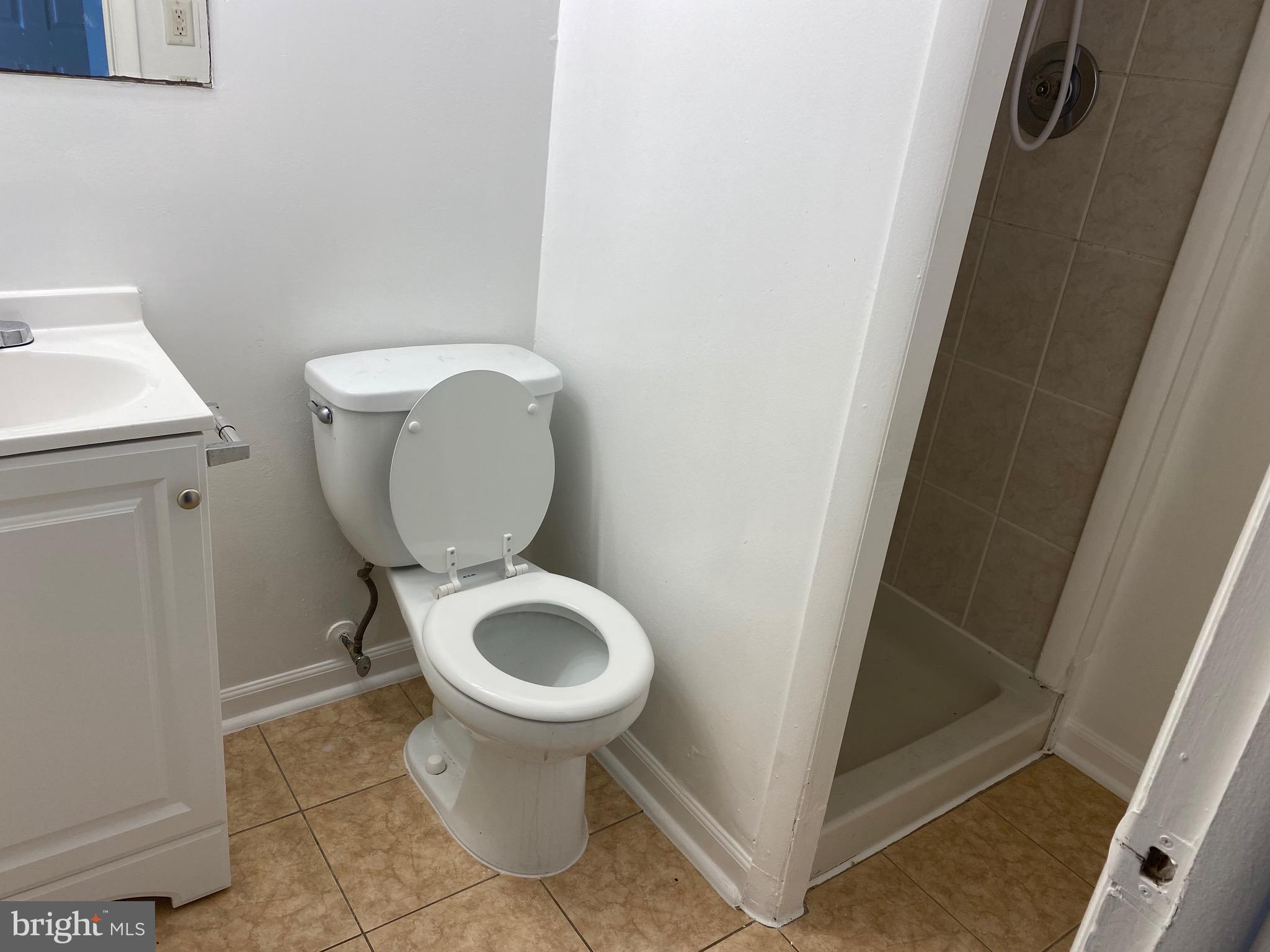 9323 Matador Road Columbia, MD 21045 - Photo 13 of 14 a bathroom with a toilet and a sink