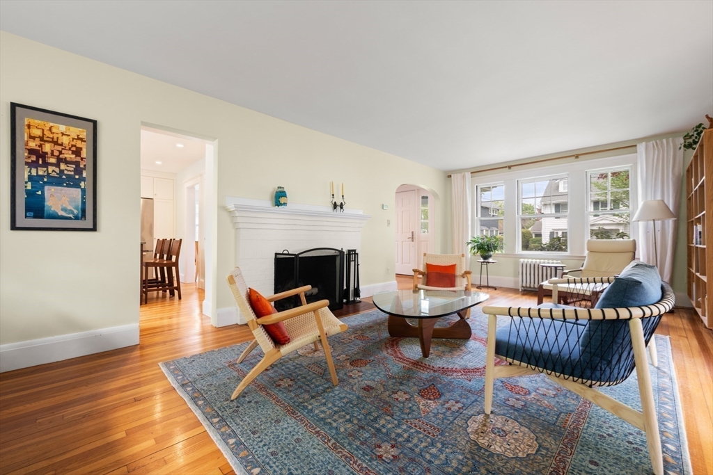 8 Charlotte Road Marblehead, MA 01945 - Photo 9 of 37 a living room with furniture and a fireplace