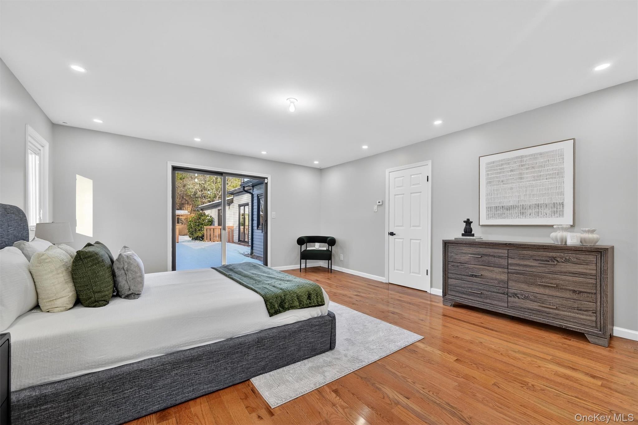 503 Station Road Rock Tavern, NY 12575 - Photo 26 of 47 Bedroom featuring access to outside, light wood-style flooring, and recessed lighting