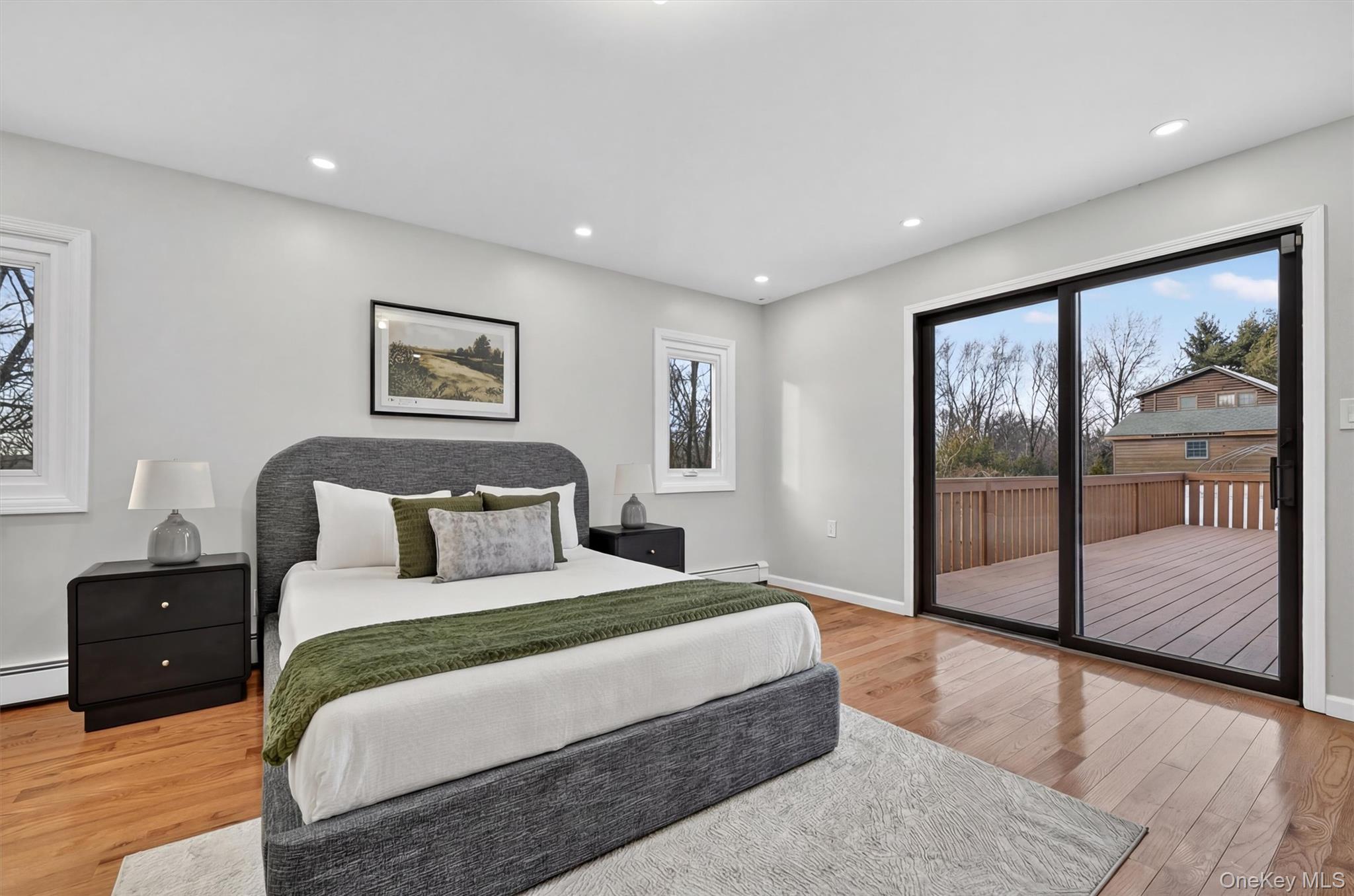 503 Station Road Rock Tavern, NY 12575 - Photo 27 of 47 Bedroom with light wood-style floors, multiple windows, access to outside, and recessed lighting