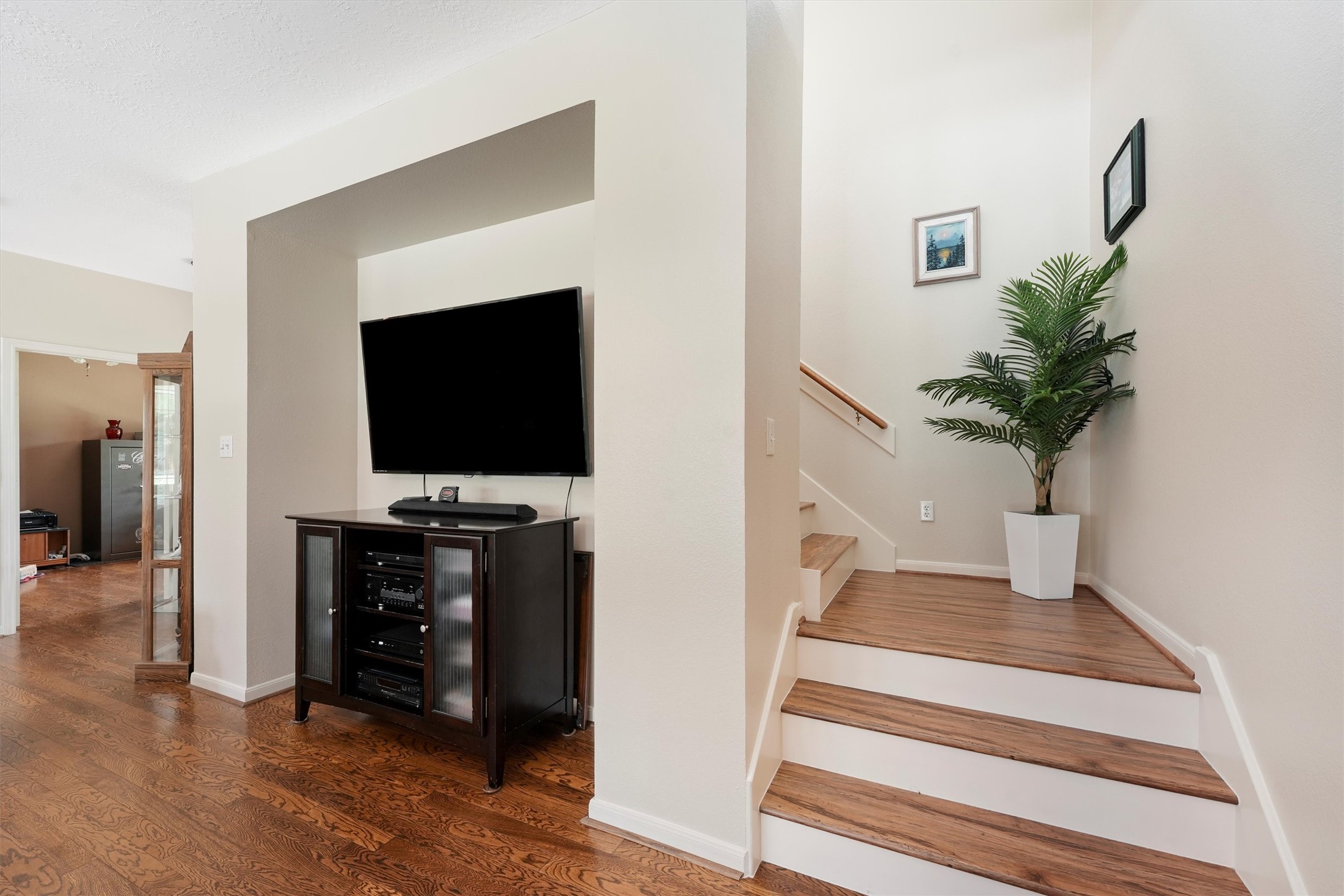6803 Treaschwig Road Spring, TX 77373 - Photo 6 of 22 a living room with furniture and a flat screen tv