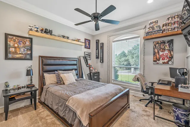 a bedroom with a bed and a table in it