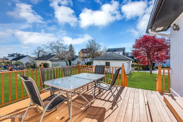 a view of a chairs and table in the patio