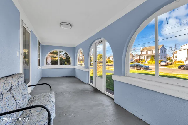 a view of room with window and tub