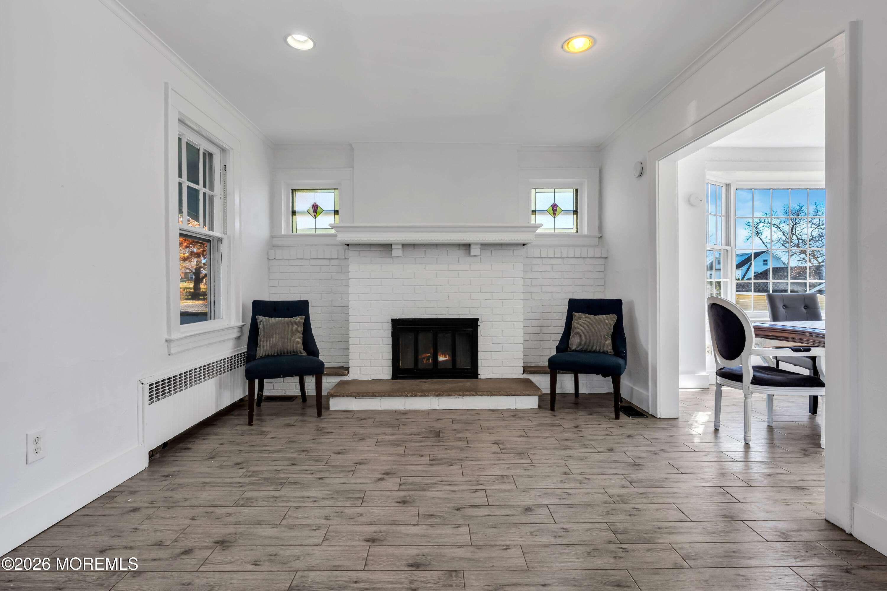3 Royal Place Long Branch, NJ 07740 - Photo 4 of 23 a living room with furniture and a fireplace