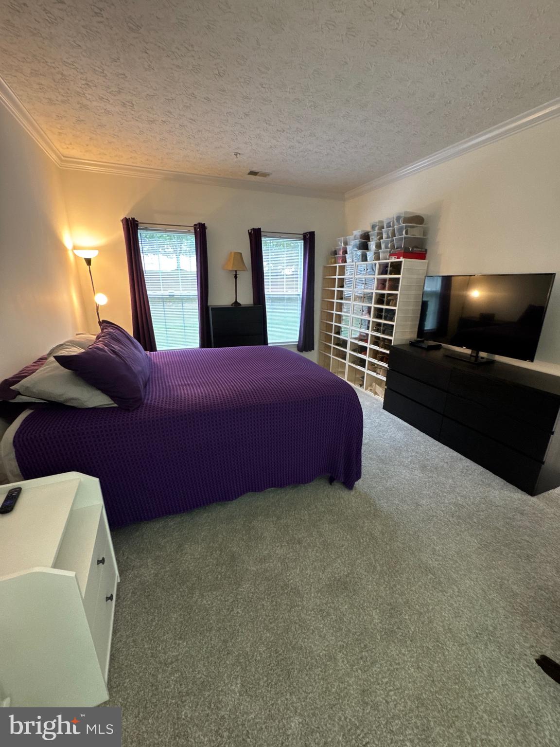 5144 Brightleaf Court, Unit 5144 Rosedale, MD 21237 - Photo 19 of 47 a bedroom with a bed and window