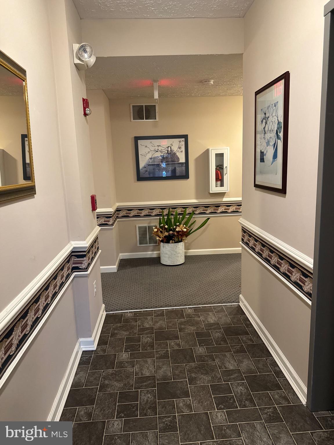 5144 Brightleaf Court, Unit 5144 Rosedale, MD 21237 - Photo 3 of 47 a room with a table and chairs