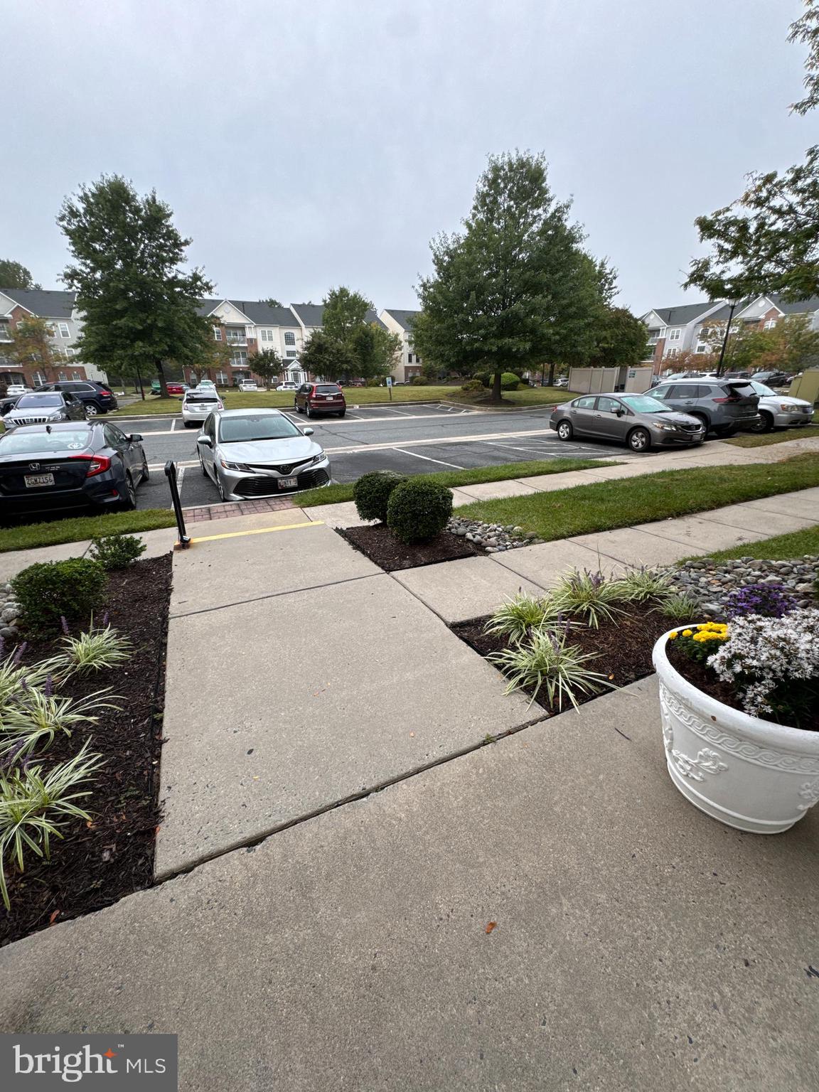 5144 Brightleaf Court, Unit 5144 Rosedale, MD 21237 - Photo 34 of 47 a view of a garden with cars