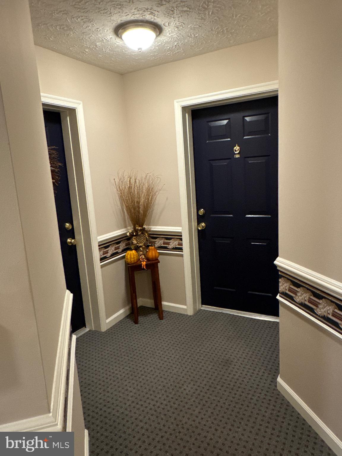 5144 Brightleaf Court, Unit 5144 Rosedale, MD 21237 - Photo 4 of 47 a view of a hallway with workspace