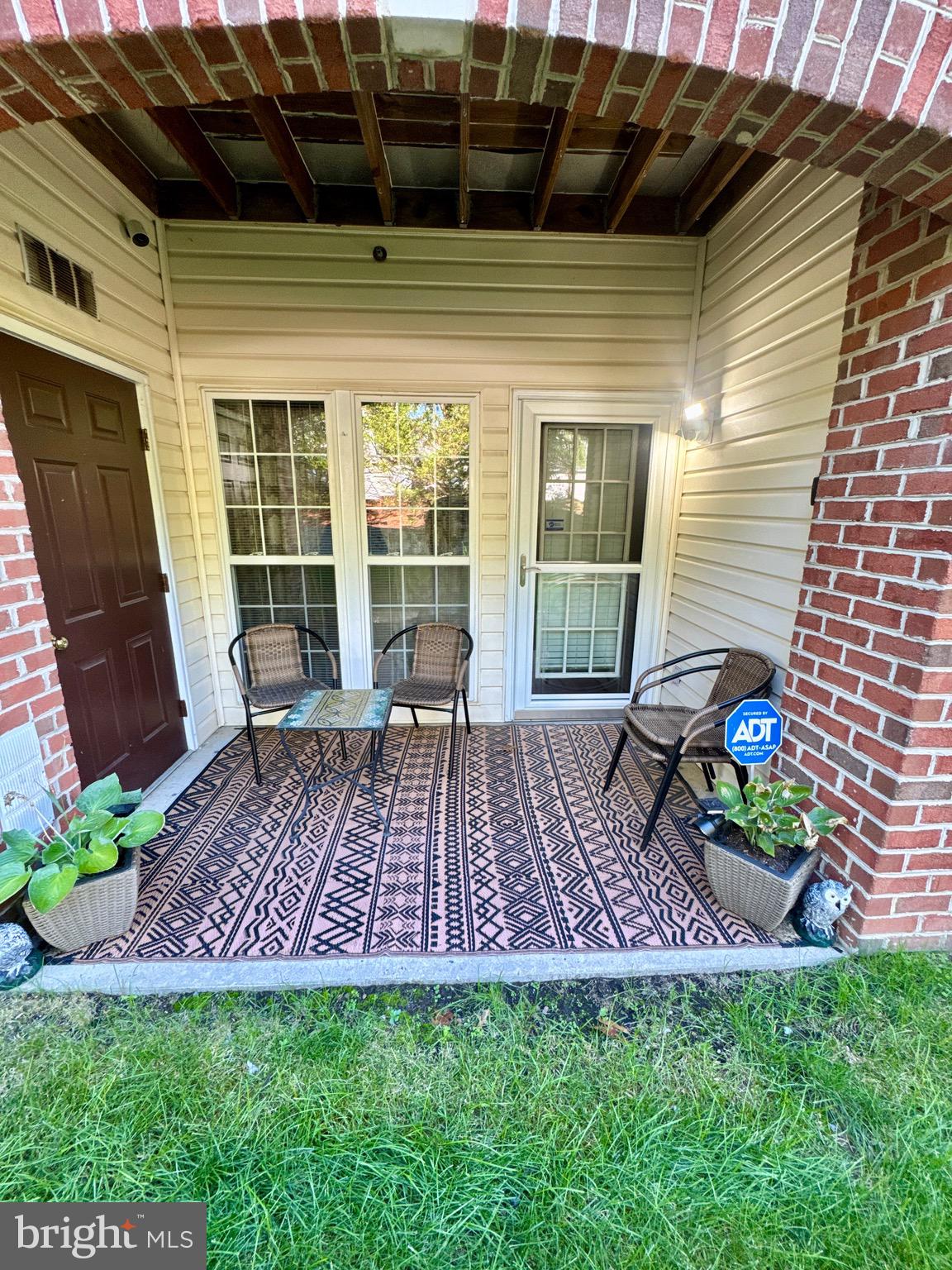 5144 Brightleaf Court, Unit 5144 Rosedale, MD 21237 - Photo 43 of 47 a view of a backyard with a patio