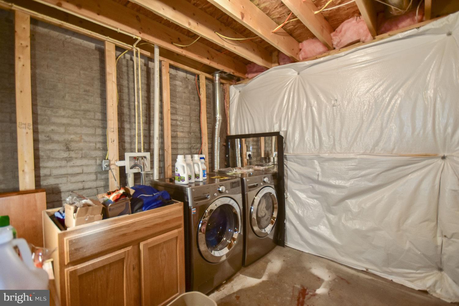 1240 Steed Street Ranson, WV 25438 - Photo 23 of 30 a utility room with dryer and washer
