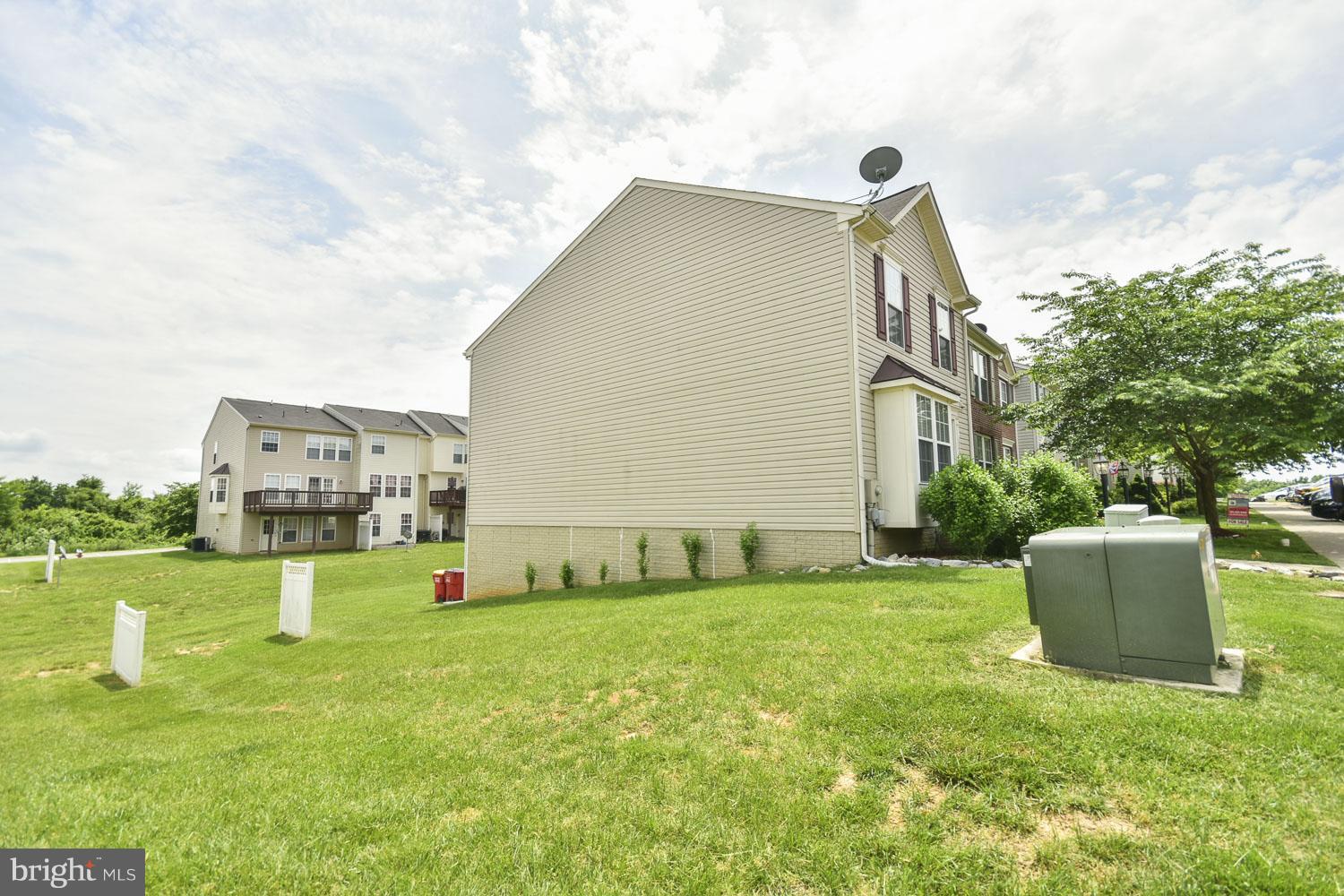 1240 Steed Street Ranson, WV 25438 - Photo 25 of 30 a view of a house with a backyard