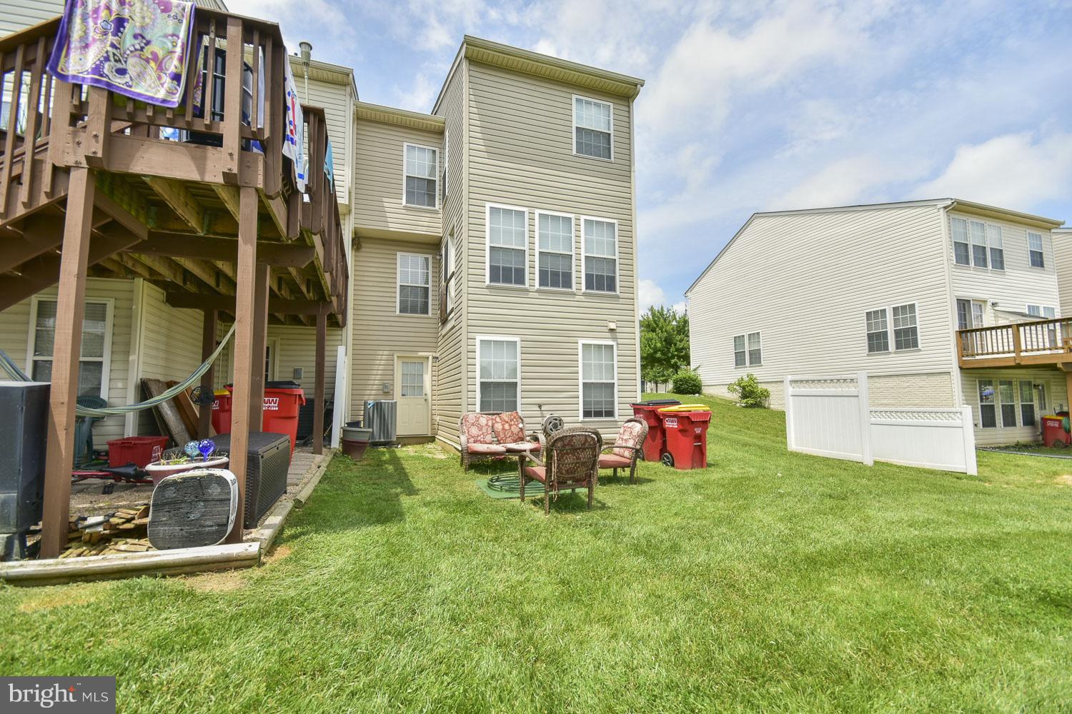 1240 Steed Street Ranson, WV 25438 - Photo 27 of 30 a view of yard in front of house with outdoor seating